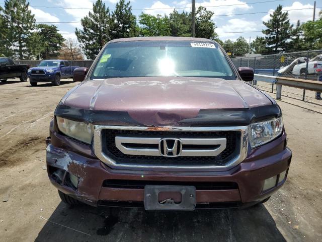 Photo 5 from auction – 2011 HONDA RIDGELINE with VIN 5FPYK1F5XBB003909