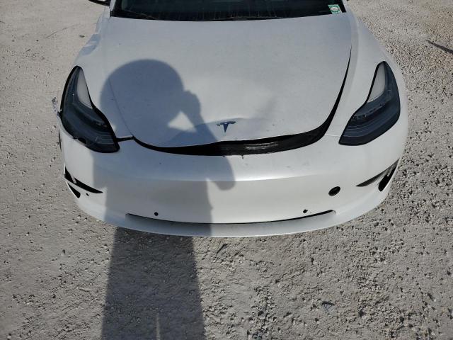 Photo 11 from auction – 2021 TESLA MODEL 3 with VIN 5YJ3E1EC6MF862721