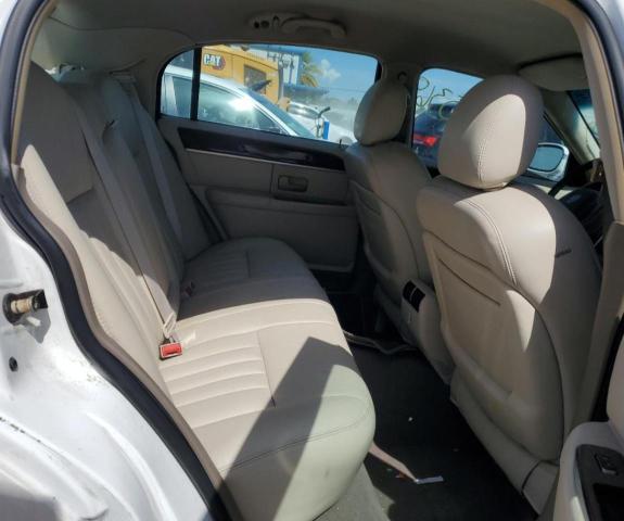Photo 10 from auction – 2004 LINCOLN TOWN CAR E with VIN 1LNHM81W44Y654303