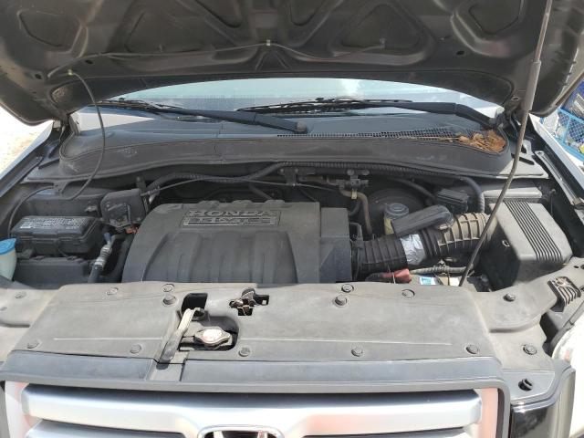 Photo 11 from auction – 2006 HONDA PILOT EX with VIN 5FNYF28416B048203