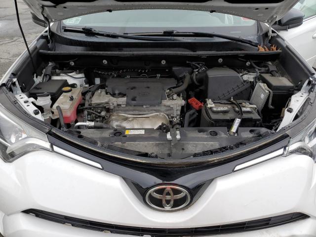 Photo 12 from auction – 2018 TOYOTA RAV4 LE with VIN 2T3BFREV3JW755706