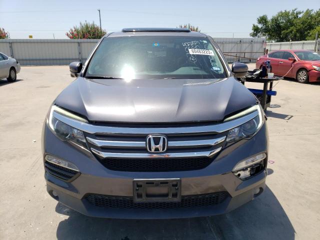 Photo 5 from auction – 2018 HONDA PILOT EXL with VIN 5FNYF5H56JB005771