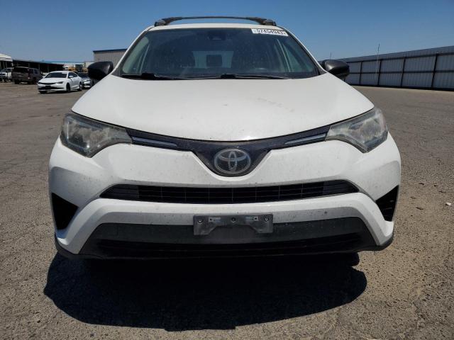 Photo 5 from auction – 2018 TOYOTA RAV4 LE with VIN JTMZFREV7JJ731597