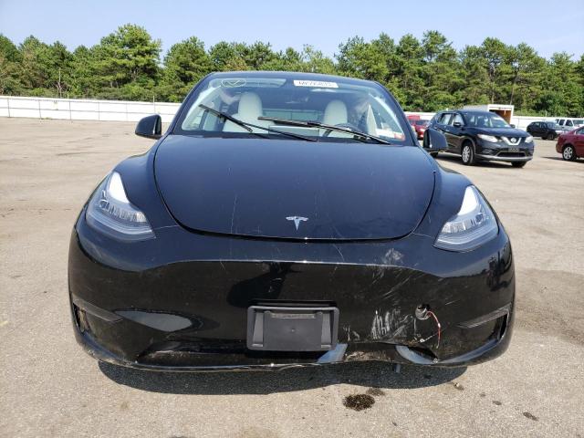 Photo 5 from auction – 2023 TESLA MODEL Y with VIN 7SAYGDEE1PA118516