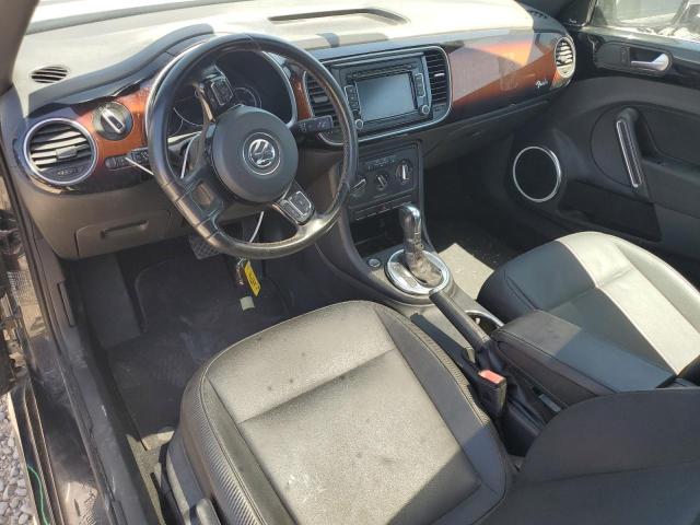 Photo 8 from auction – 2013 VOLKSWAGEN BEETLE with VIN 3VWJX7AT2DM656928