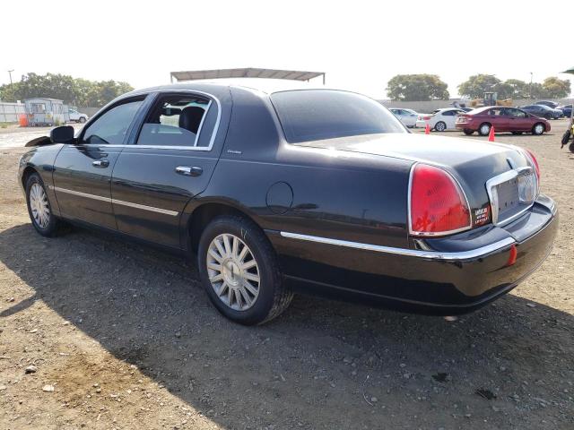 Photo 2 from auction – 2003 LINCOLN TOWN CAR E with VIN 1LNHM81W83Y643044