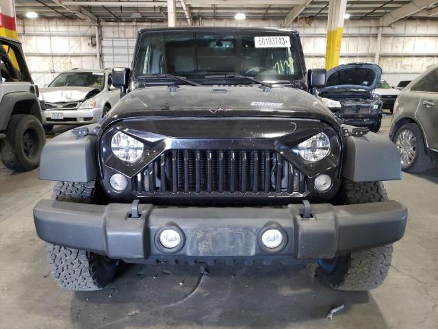 Photo 5 from auction – 2016 JEEP WRANGLER U with VIN 1C4BJWDG0GL235975