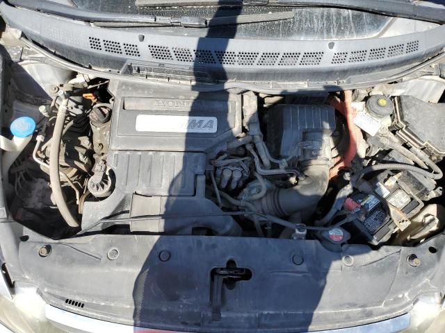 Photo 11 from auction – 2006 HONDA CIVIC HYBR with VIN JHMFA36256S016871