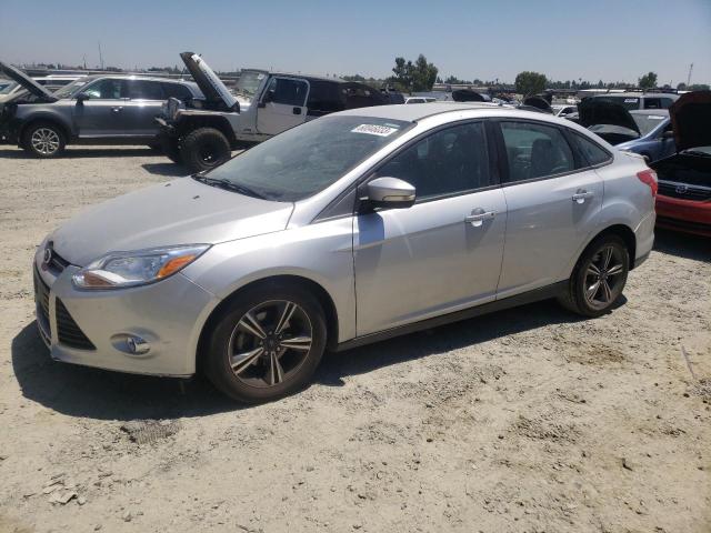 FORD FOCUS SE 2014 with VIN 1FADP3F27EL271575 - Photo from auction