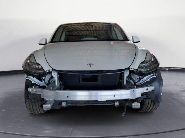 Photo 5 from auction – 2022 TESLA MODEL Y with VIN 7SAYGDEE7NF385952
