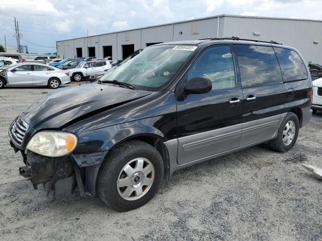 KIA SEDONA EX 2002 with VIN KNDUP131526323404 - Photo from auction