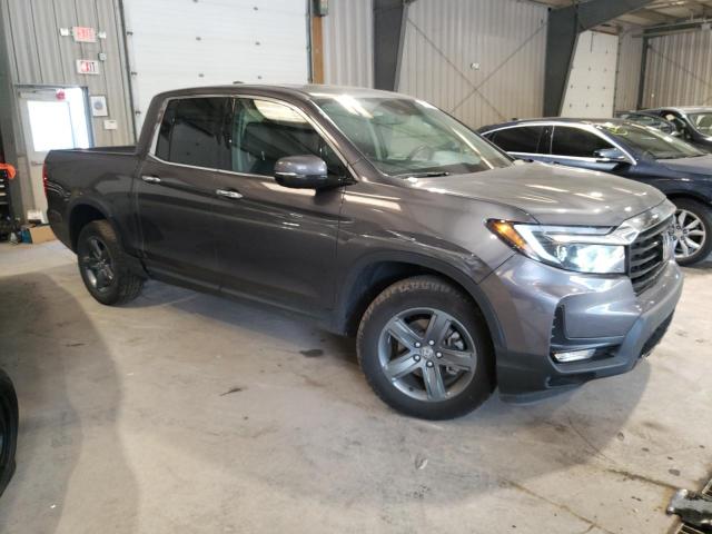Photo 4 from auction – 2022 HONDA RIDGELINE with VIN 5FPYK3F70NB036497