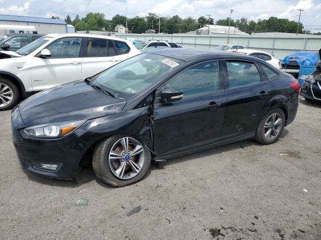 FORD FOCUS SE 2018 with VIN 1FADP3FE2JL226127 - Photo from auction