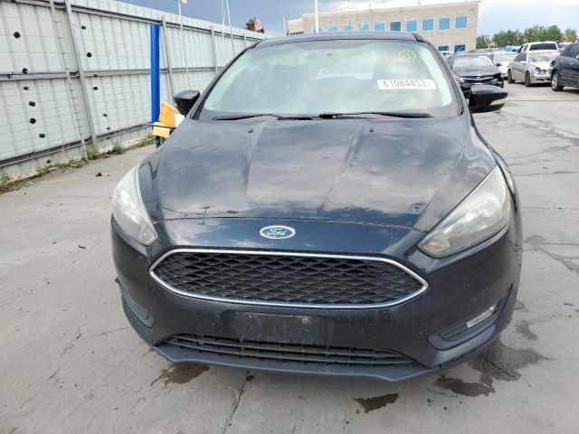 Photo 5 from auction – 2015 FORD FOCUS SE with VIN 1FADP3K21FL380055