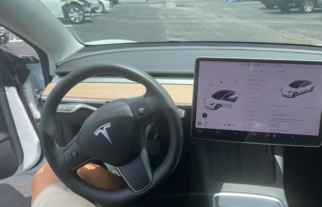 Photo 9 from auction – 2022 TESLA MODEL 3 with VIN 5YJ3E1EA3NF187314
