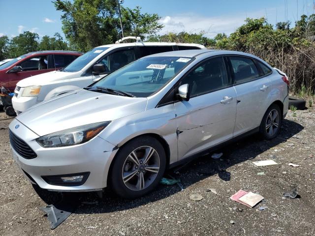FORD FOCUS SE 2017 with VIN 1FADP3FEXHL282617 - Photo from auction