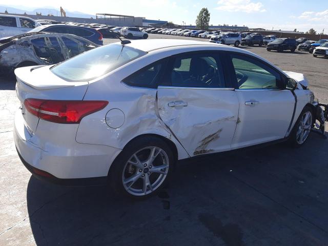Photo 3 from auction – 2016 FORD FOCUS TITA with VIN 1FADP3J24GL306342