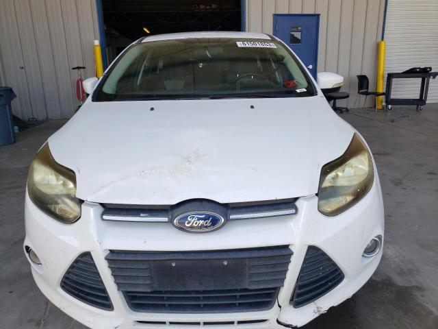 Foto 5 de la subasta – 2014 FORD FOCUS SE con VIN 1FADP3K26EL283044