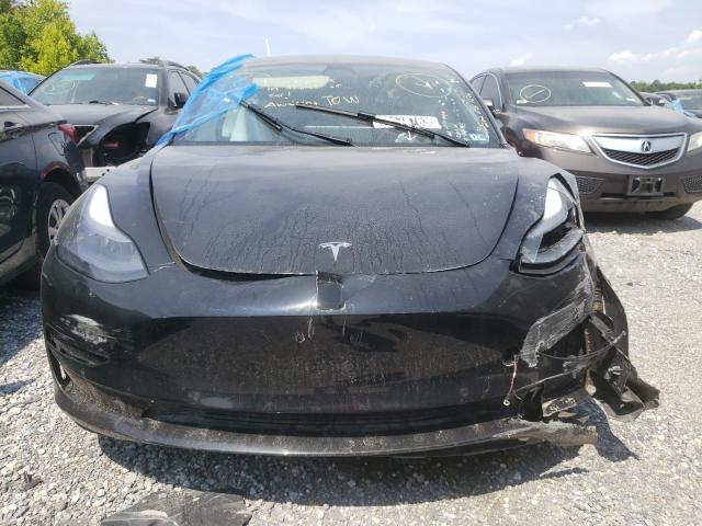 Photo 5 from auction – 2022 TESLA MODEL 3 with VIN 5YJ3E1EB9NF288558