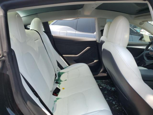 Photo 11 from auction – 2021 TESLA MODEL 3 with VIN 5YJ3E1EA5MF082837