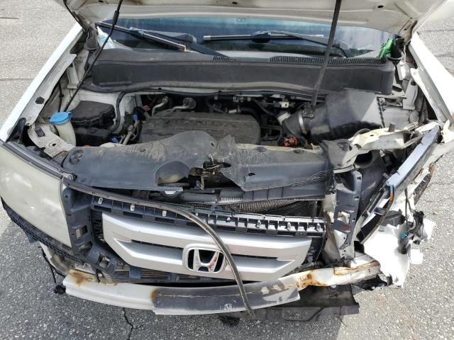 Photo 12 from auction – 2011 HONDA PILOT TOUR with VIN 5FNYF4H98BB103277
