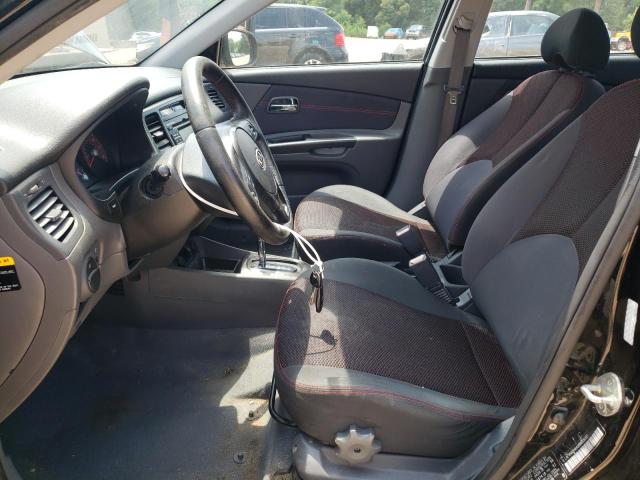 Photo 7 from auction – 2011 KIA RIO BASE with VIN KNADH4A39B6936321