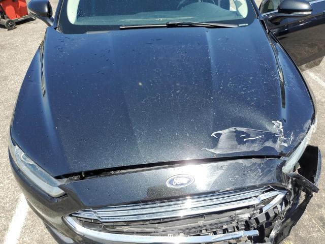 Photo 11 from auction – 2015 FORD FUSION SE with VIN 3FA6P0LU7FR305806