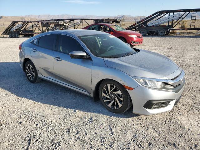 Photo 4 from auction – 2017 HONDA CIVIC EX with VIN 19XFC2F74HE046631
