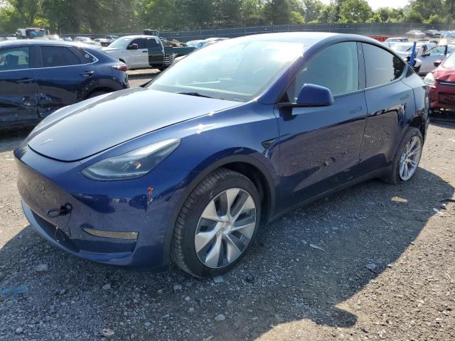 TESLA MODEL Y 2023 with VIN 7SAYGDEE8PF665706 - Photo from auction