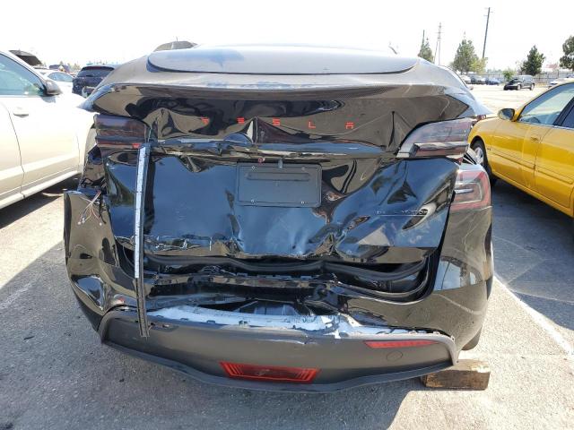 Photo 6 from auction – 2023 TESLA MODEL Y with VIN 7SAYGDEF1PF624665