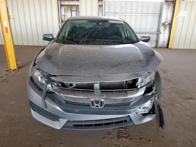Photo 5 from auction – 2018 HONDA CIVIC EX with VIN 19XFC2F73JE023203