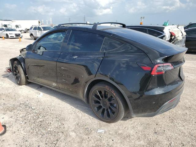 Foto 2 de la subasta – 2021 TESLA MODEL Y con VIN 5YJYGAEE8MF149109