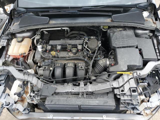 Photo 11 from auction – 2014 FORD FOCUS SE with VIN 1FADP3F29EL370186