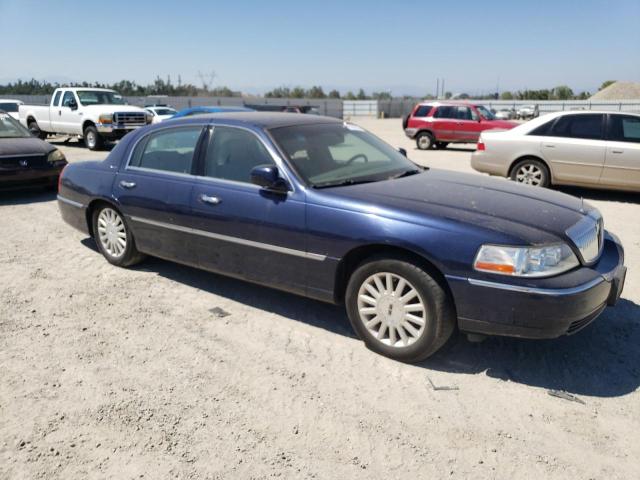 Photo 4 from auction – 2003 LINCOLN TOWN CAR E with VIN 1LNHM81W43Y638035