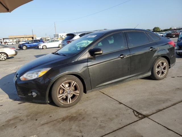 FORD FOCUS SE 2014 with VIN 1FADP3F20EL309437 - Photo from auction