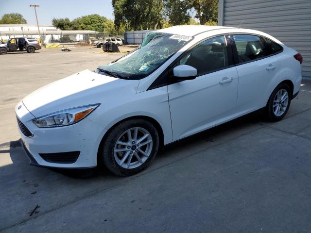FORD FOCUS SE 2018 with VIN 1FADP3F28JL272454 - Photo from auction