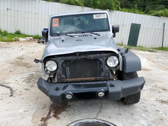 Photo 5 from auction – 2014 JEEP WRANGLER U with VIN 1C4BJWDG1EL245699