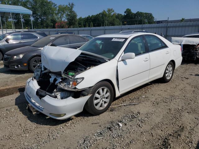 TOYOTA CAMRY LE 2004 with VIN 4T1BE32K34U275558 - Photo from auction