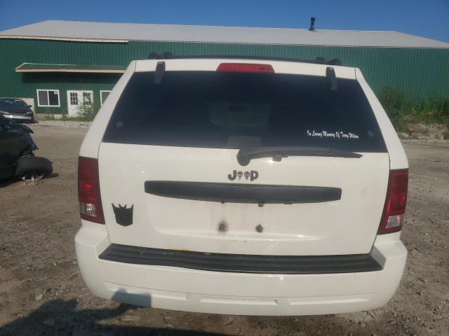 Photo 6 from auction – 2009 JEEP GRAND CHER with VIN 1J8GR48K39C548113