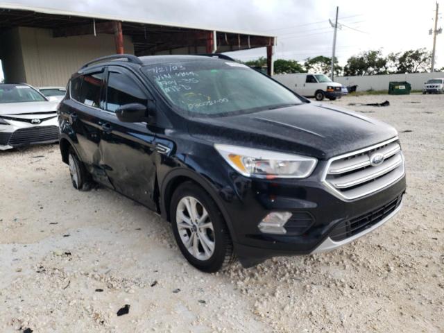 Photo 4 from auction – 2018 FORD ESCAPE SE with VIN 1FMCU0GD2JUC36844