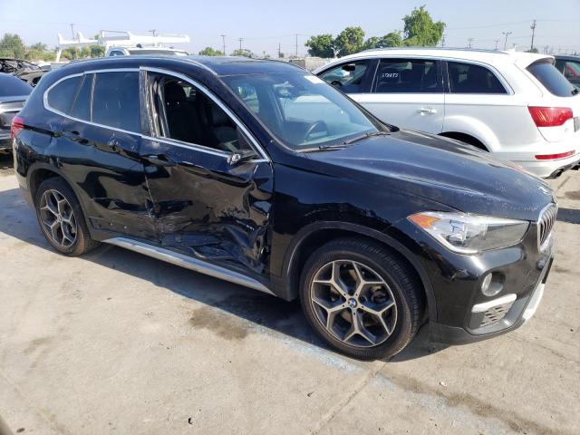 Photo 4 from auction – 2018 BMW X1 XDRIVE2 with VIN WBXHT3C30J5L26809
