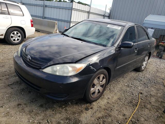 TOYOTA CAMRY LE/X 2002 with VIN 4T1BE32KX2U571450 - Photo from auction