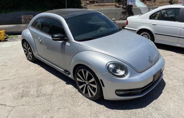 VOLKSWAGEN BEETLE TUR 2012 with VIN 3VWVA7AT0CM630443 - Photo from auction
