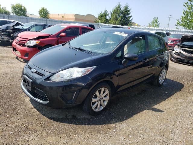 FORD FIESTA SE 2011 with VIN 3FADP4EJ8BM169520 - Photo from auction