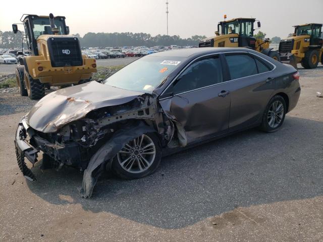 TOYOTA CAMRY LE 2017 with VIN 4T1BF1FK5HU675672 - Photo from auction