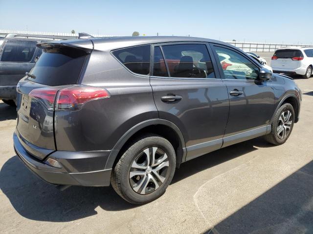 Photo 3 from auction – 2018 TOYOTA RAV4 LE with VIN JTMZFREV5JJ170087