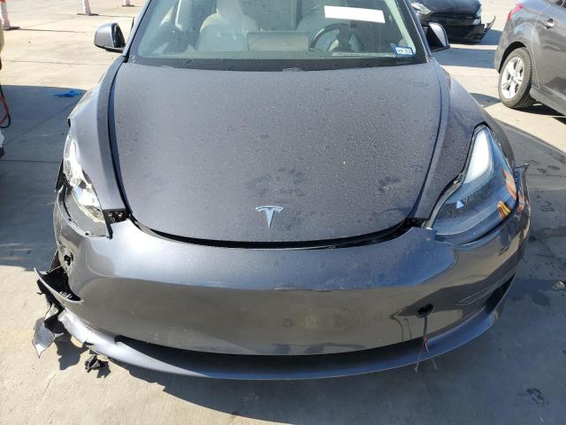 Photo 11 from auction – 2021 TESLA MODEL 3 with VIN 5YJ3E1EAXMF058582