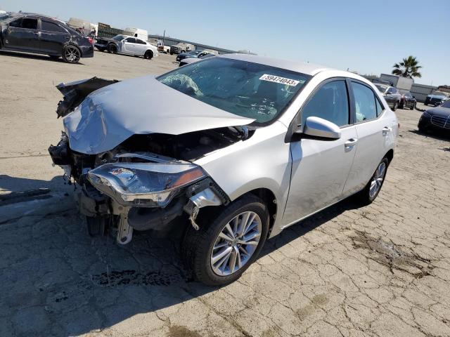 TOYOTA COROLLA L 2014 with VIN 5YFBURHE2EP103578 - Photo from auction