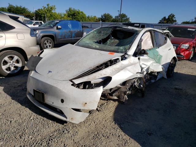 TESLA MODEL Y 2022 with VIN 7SAYGDEEXNF385931 - Photo from auction