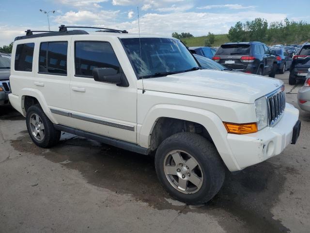Photo 4 from auction – 2010 JEEP COMMANDER with VIN 1J4RG4GK9AC130435